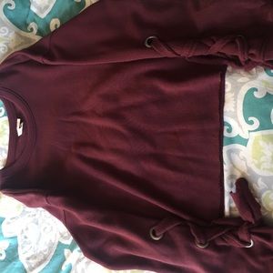 Long-sleeved Sky and Sparrow crop shirt.